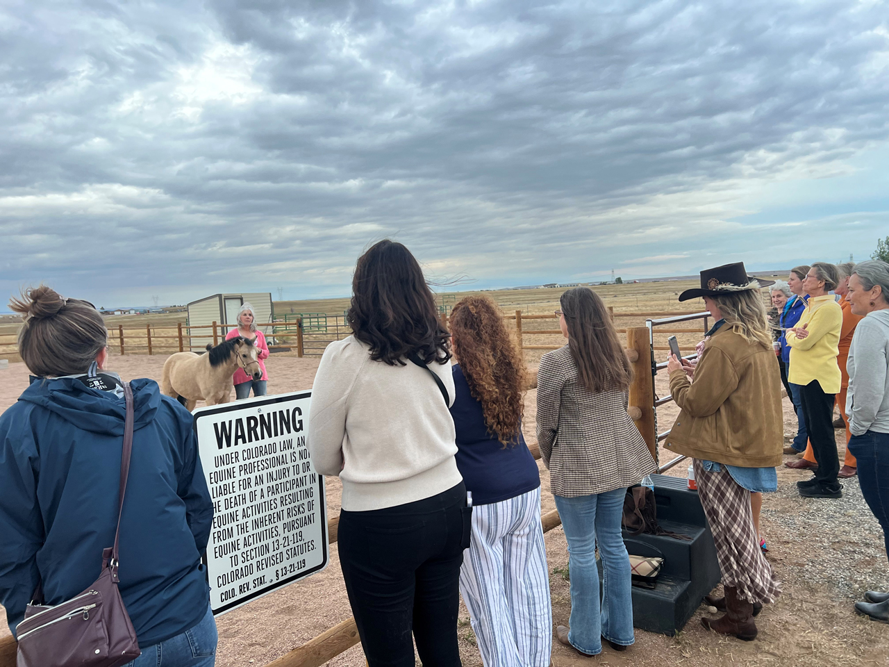 Members of Northern Colorado Community ask questions to Amy at Whole Heart Ranch about how horses can help and restore.